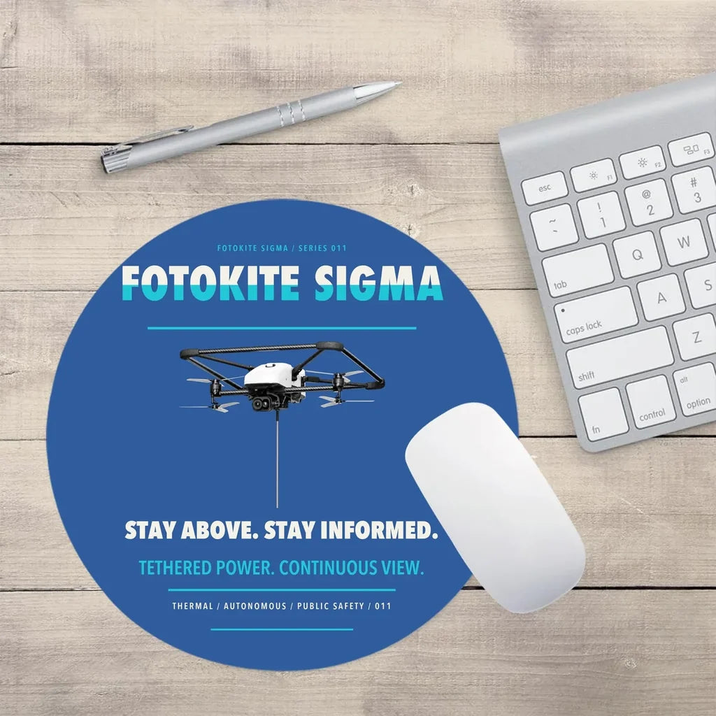 Fotokite Sigma design on blue round mouse pad