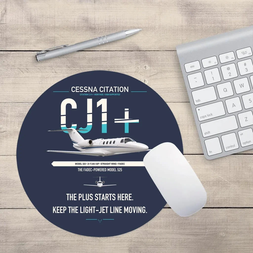 Cessna Citation CJ1+ design on navy blue round mouse pad
