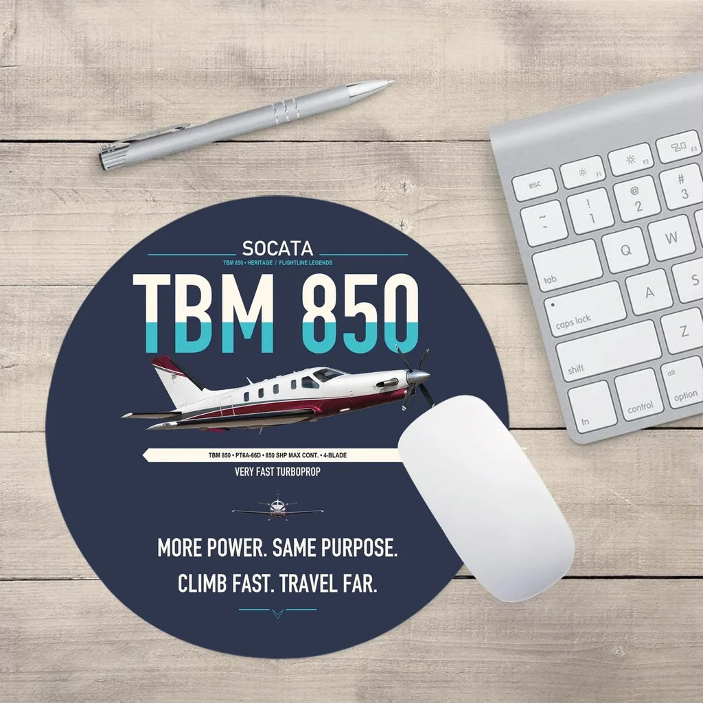 Socata TBM 850 design on navy blue round mouse pad