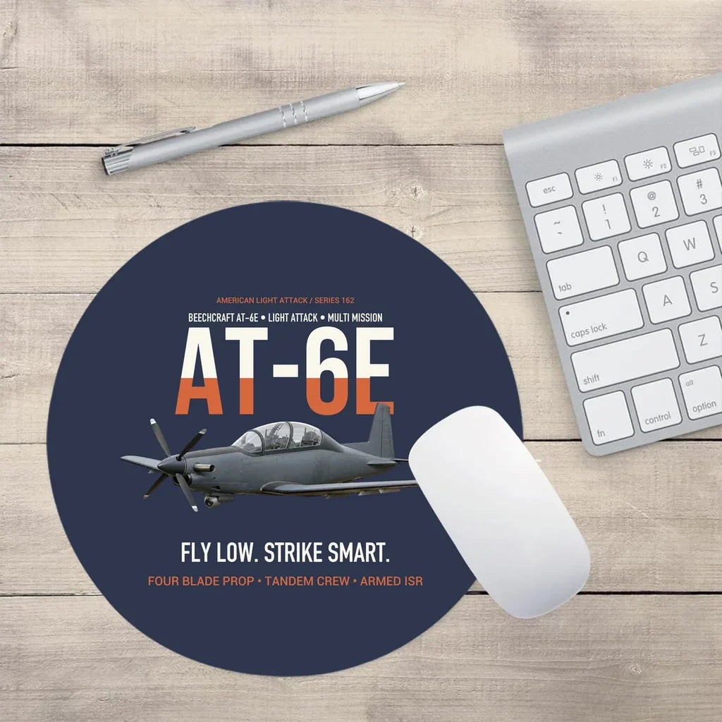 AT-6E Wolverine Light Attack design on navy blue round mouse pad