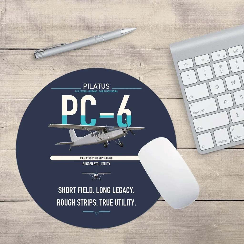 Pilatus PC-6 Porter design on navy blue round mouse pad