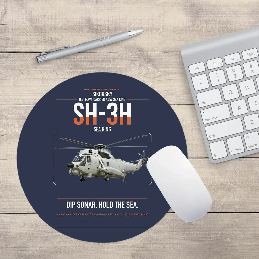 Sikorsky SH-3H Sea King design on navy blue round mouse pad