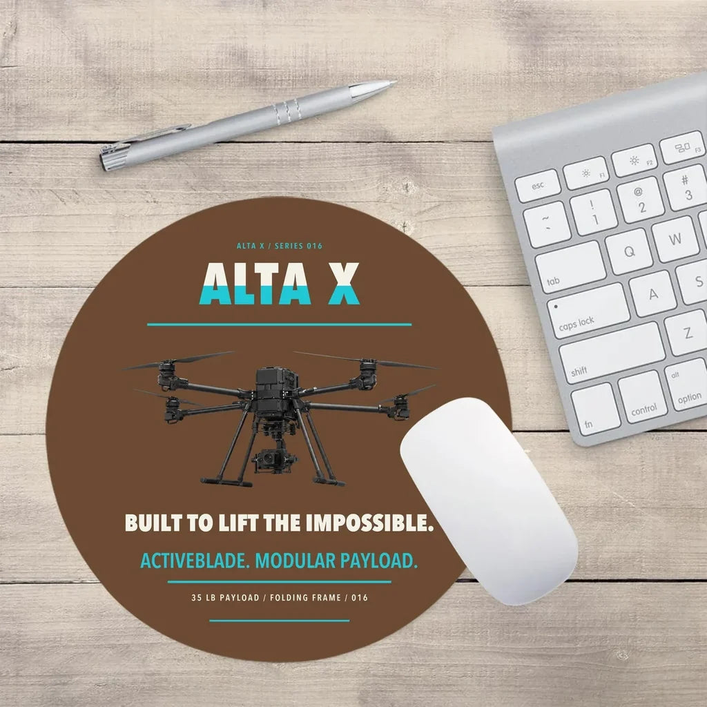 Freefly Alta X design on brown round mouse pad