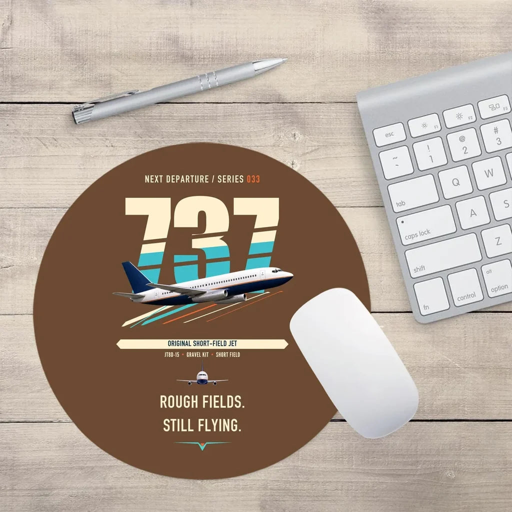 Boeing 737-200 design on brown round mouse pad