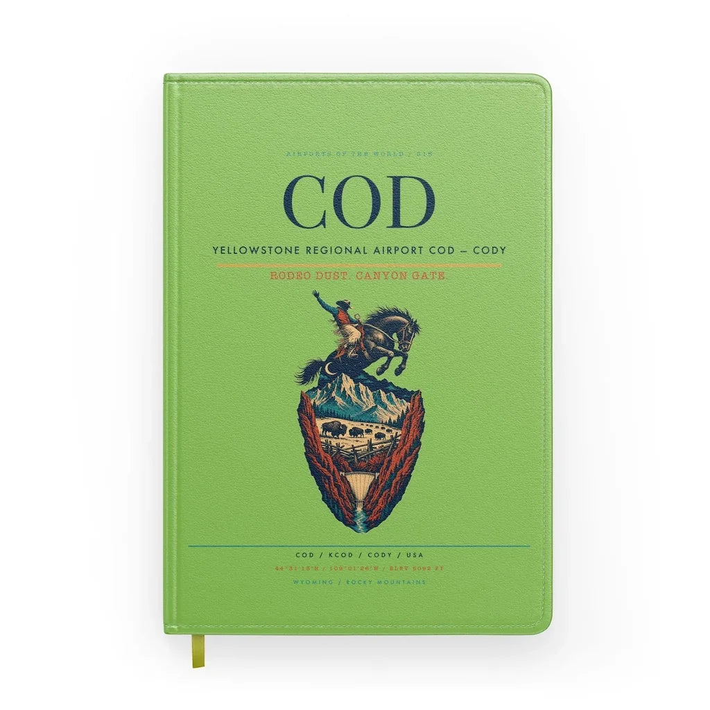 Yellowstone Regional Airport (COD) design on light green notebook