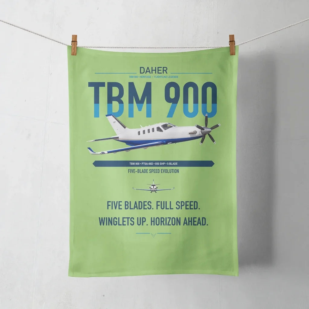 Daher TBM 900 design on light green towel