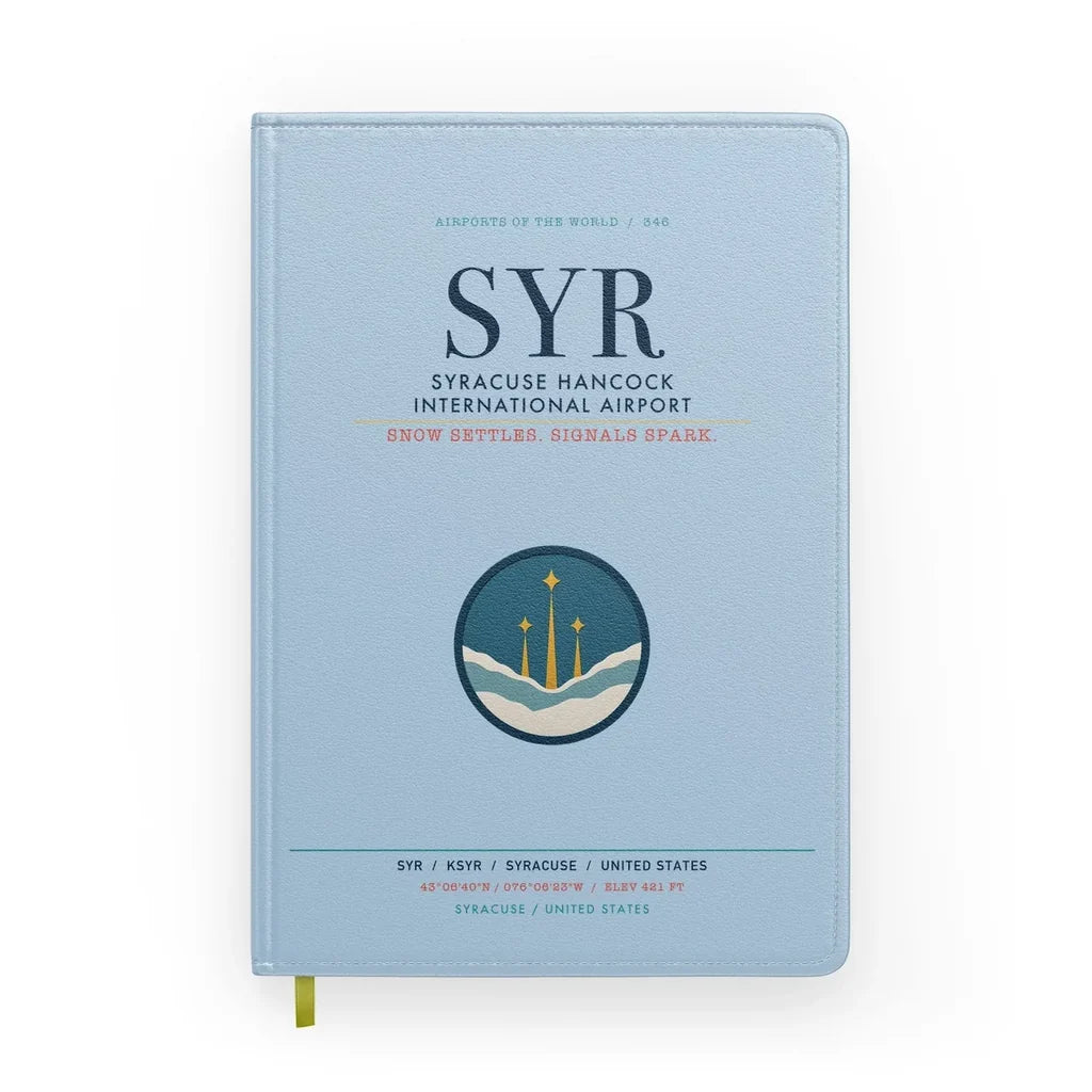 Syracuse Hancock International Airport (SYR) design on light blue notebook