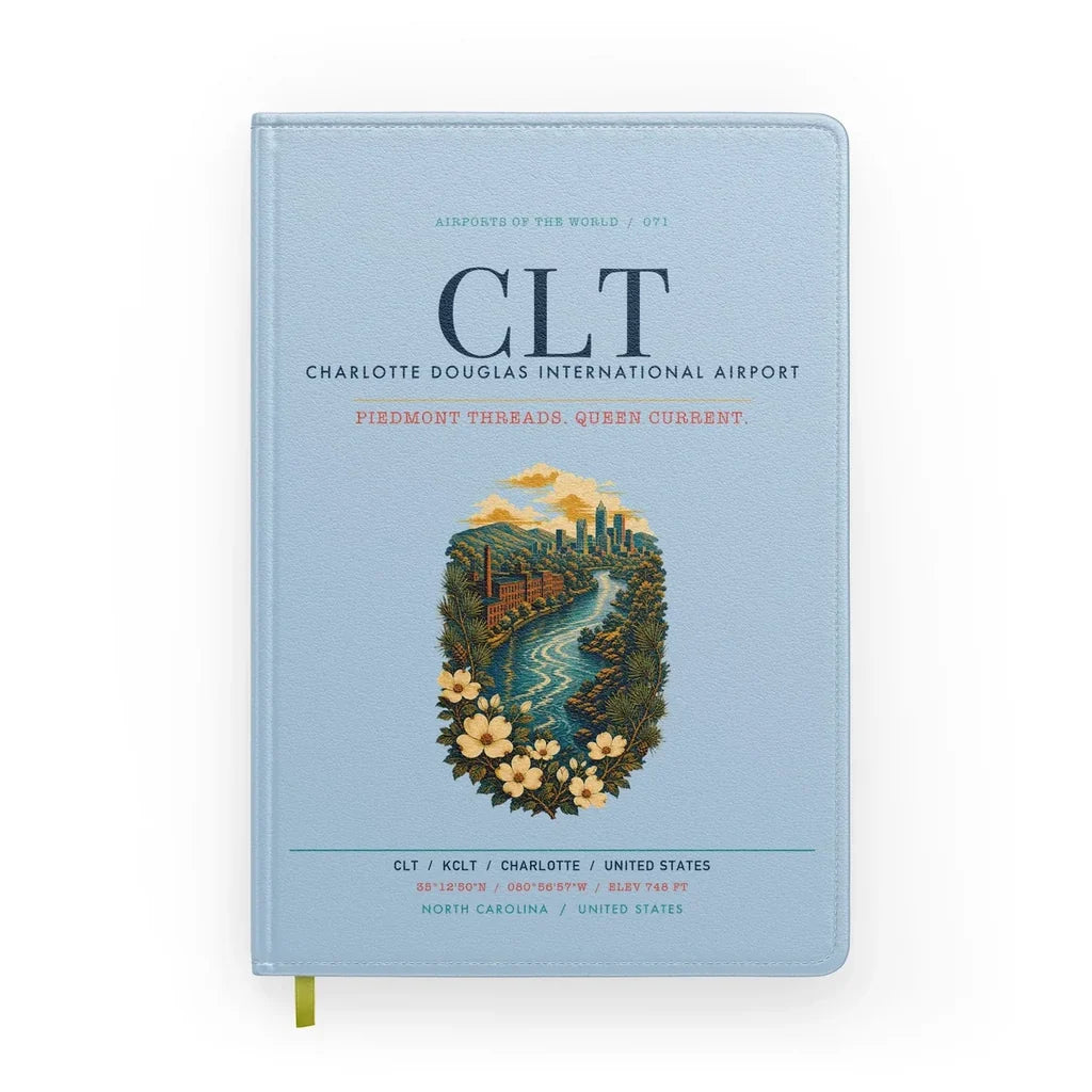 Charlotte Douglas International Airport (CLT) design on light blue notebook