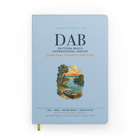 Thumbnail for Daytona Beach International Airport (DAB) design on light blue notebook