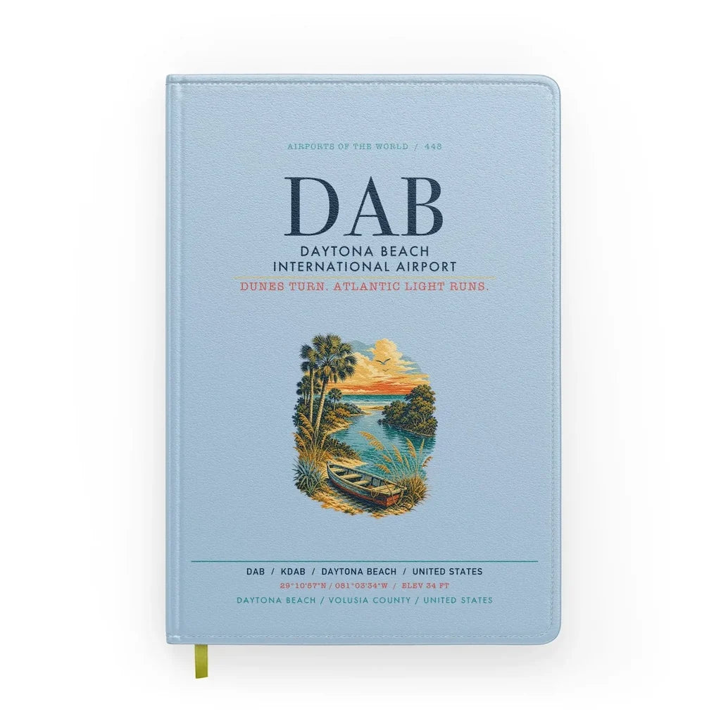 Daytona Beach International Airport (DAB) design on light blue notebook