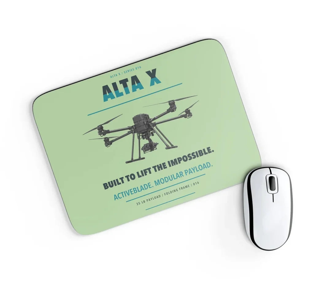 Freefly Alta X design on light green rectangle mouse pad