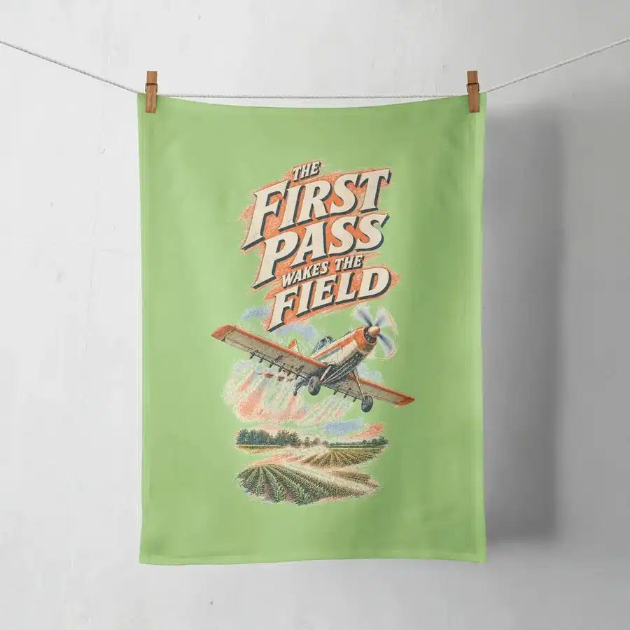 The First Pass Wakes The Field design on light green towel