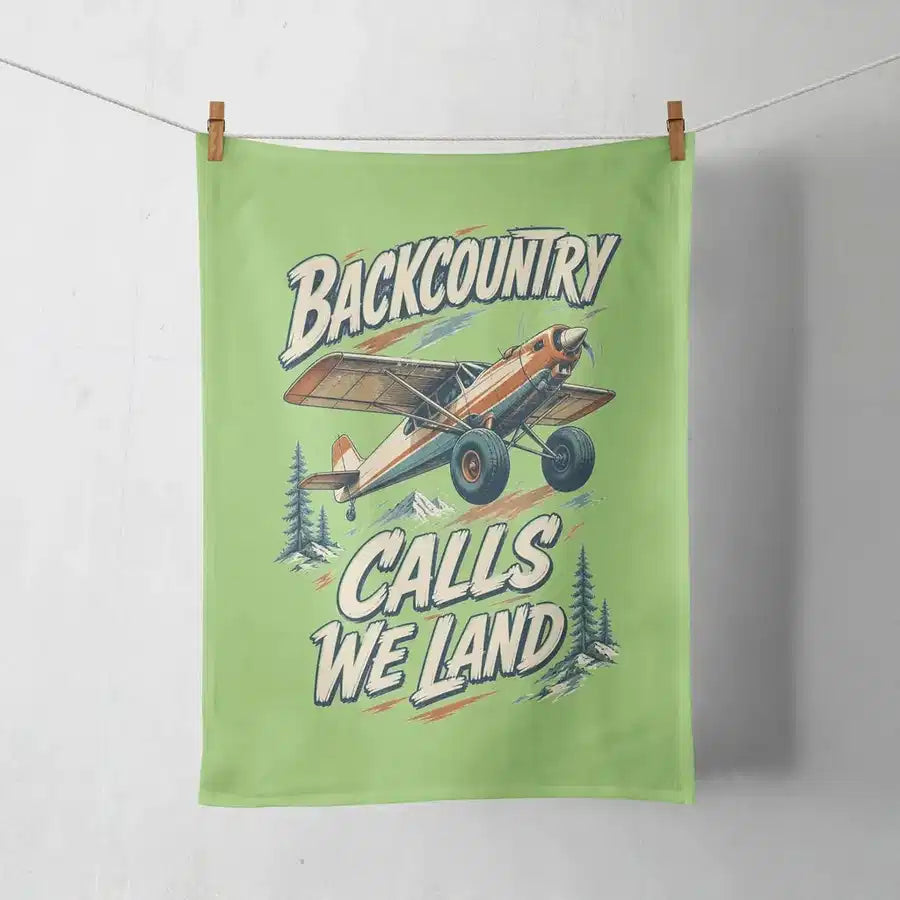 Backcountry Calls We Land design on light green towel