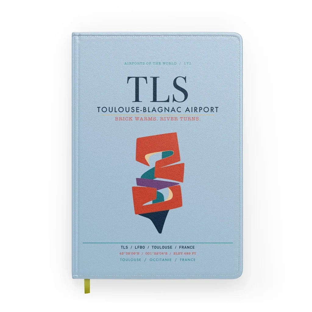 Toulouse-Blagnac Airport (TLS) design on light blue notebook
