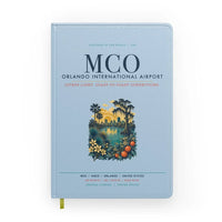 Thumbnail for Orlando International Airport (MCO) design on light blue notebook