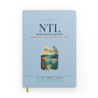 Thumbnail for Newcastle Airport (NTL) design on light blue notebook