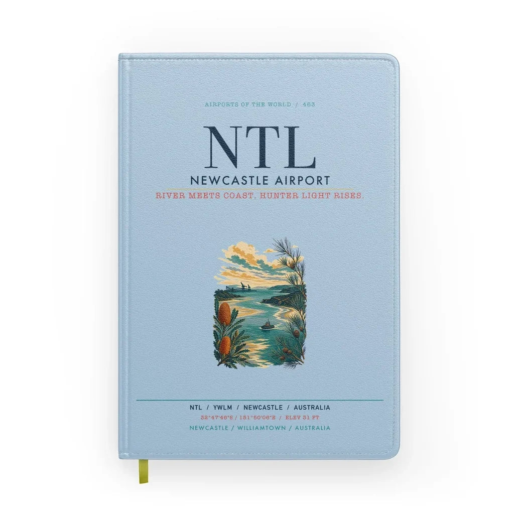 Newcastle Airport (NTL) design on light blue notebook