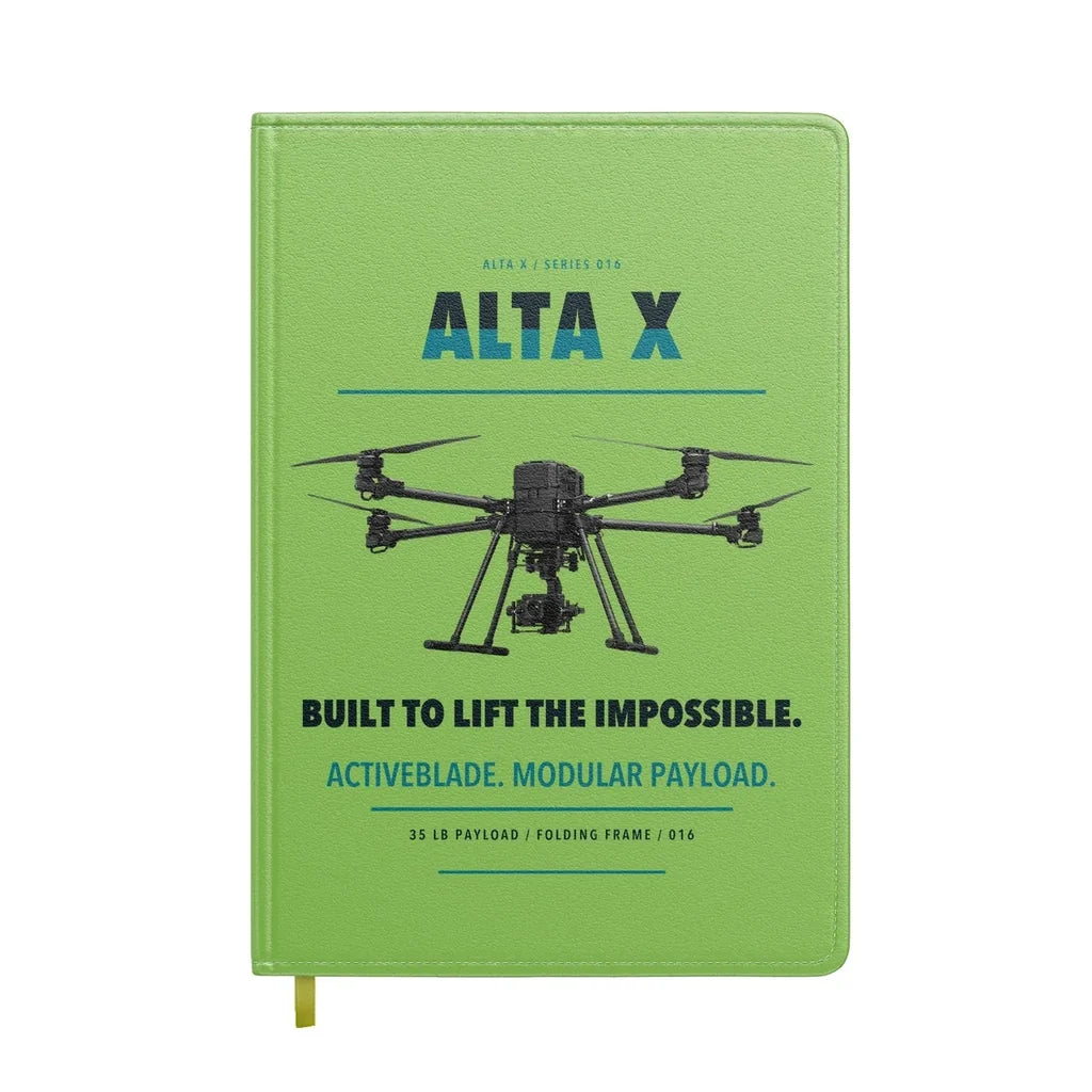 Freefly Alta X design on light green notebook