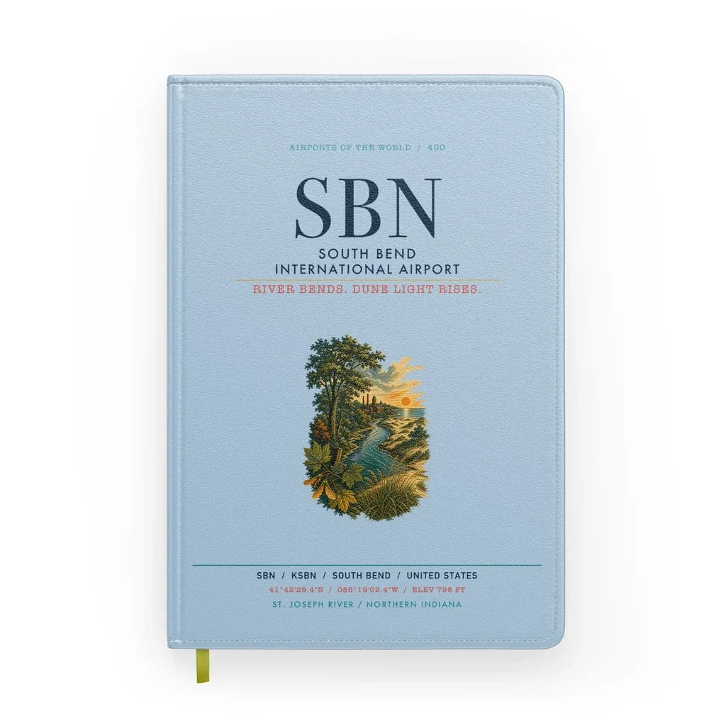 South Bend International Airport (SBN) design on light blue notebook