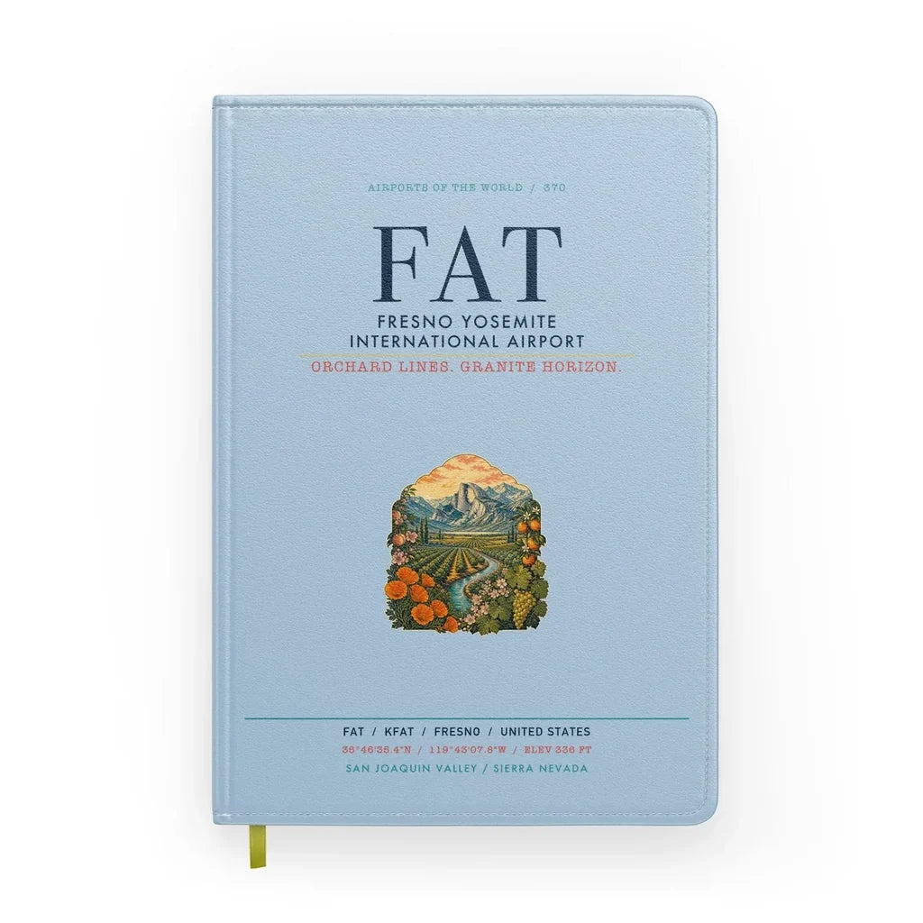 Fresno Yosemite International Airport (FAT) design on light blue notebook