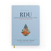 Thumbnail for Raleigh-Durham International Airport (RDU) design on light blue notebook
