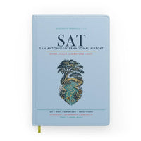 Thumbnail for San Antonio International Airport (SAT) design on light blue notebook