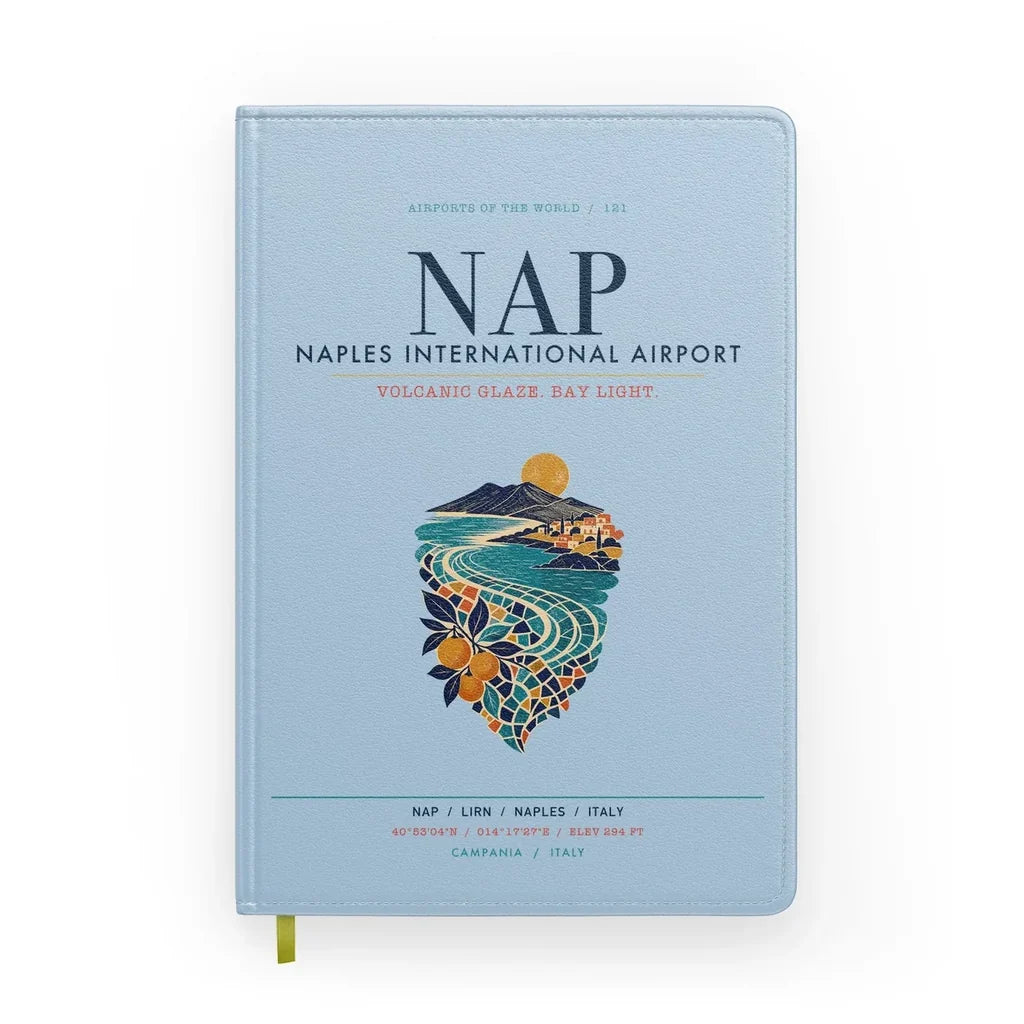Naples International Airport (NAP) design on light blue notebook