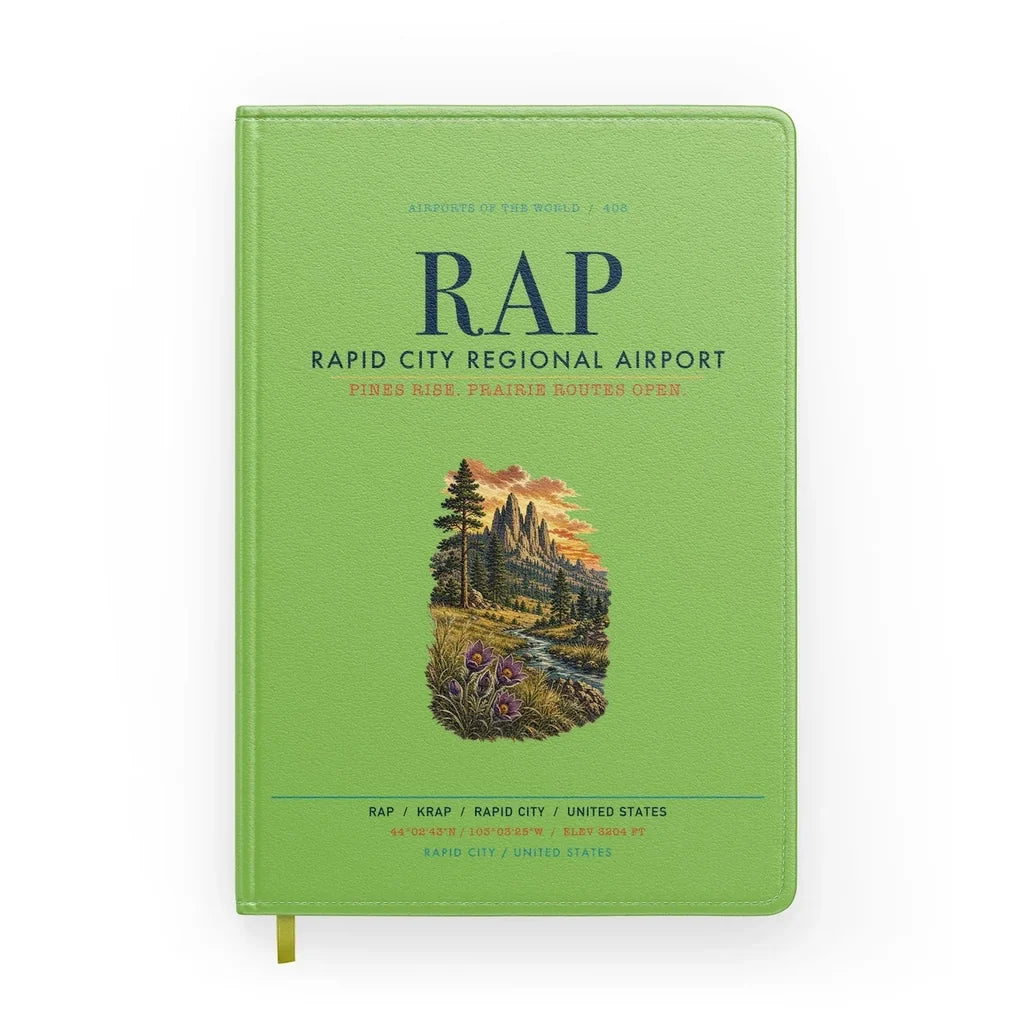 Rapid City Regional Airport (RAP) design on light green notebook