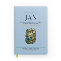 Thumbnail for Jackson–Medgar Wiley Evers International Airport (JAN) design on light blue notebook