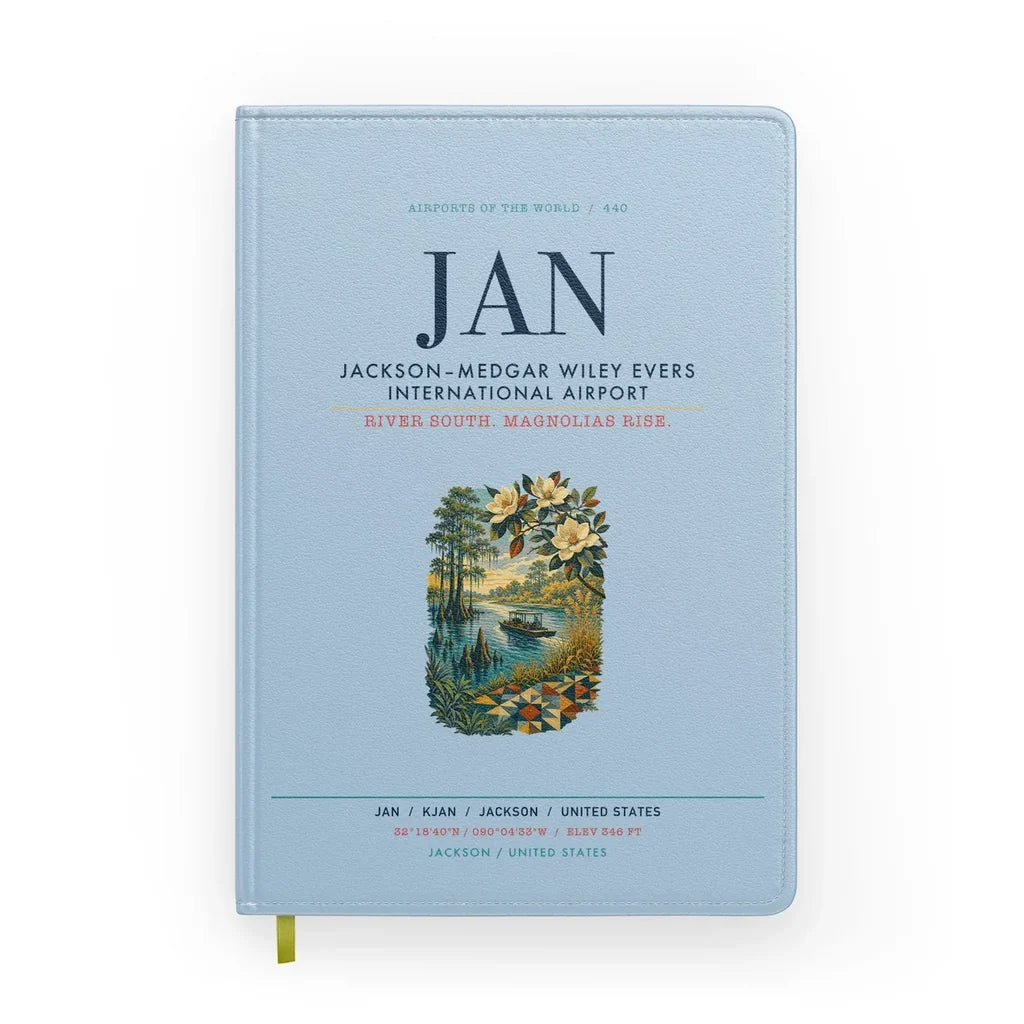 Jackson–Medgar Wiley Evers International Airport (JAN) design on light blue notebook