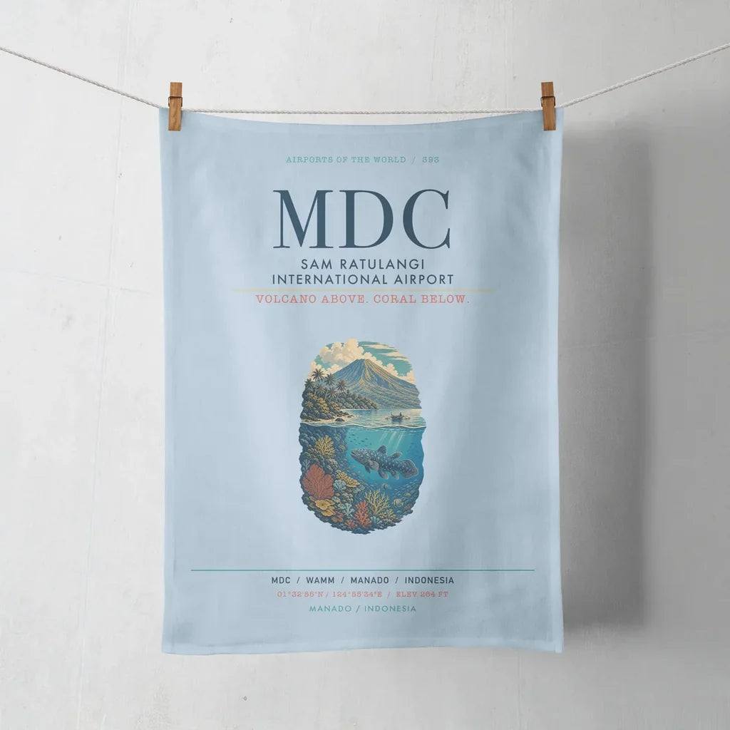Sam Ratulangi International Airport Manado (MDC) design on light blue towel