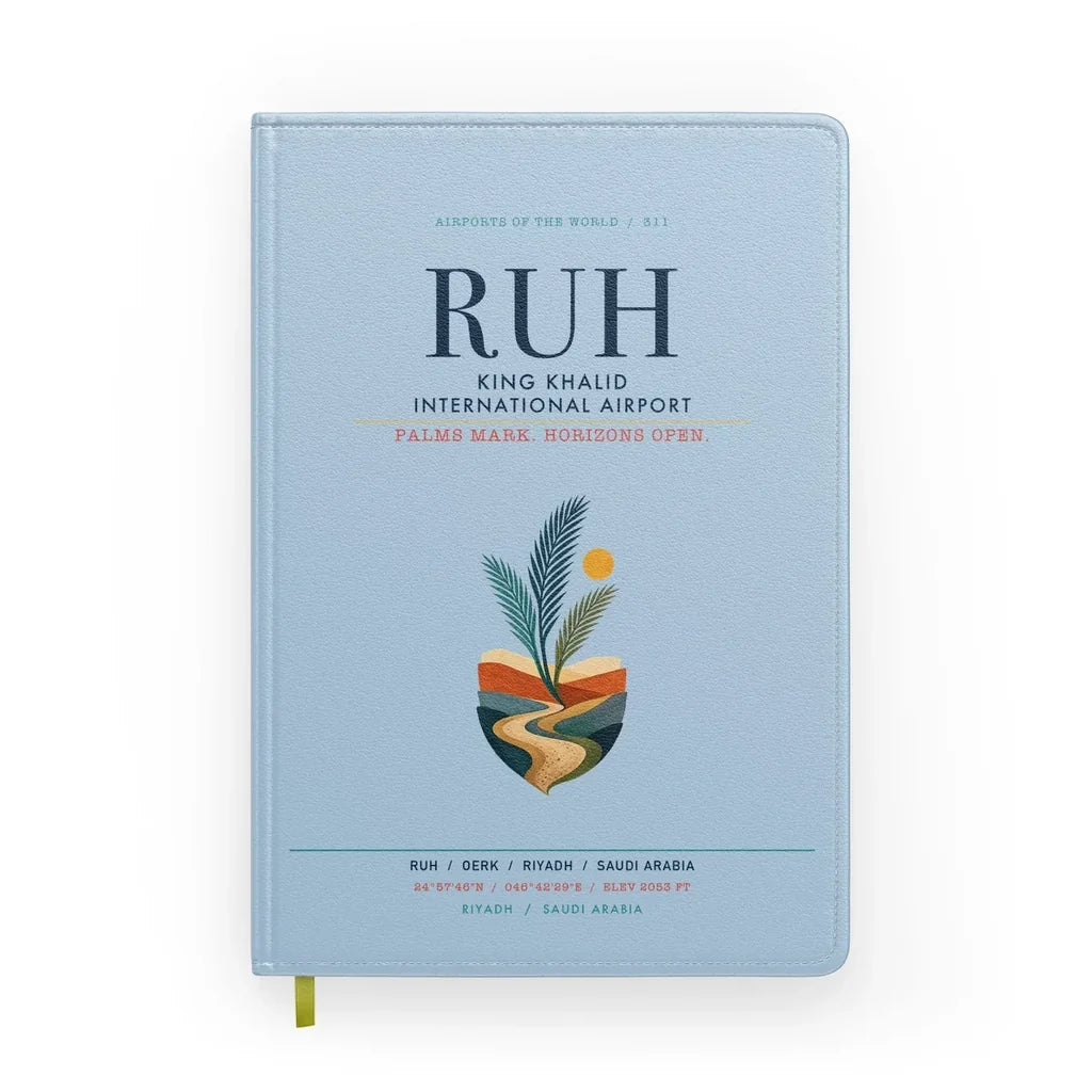 King Khalid International Airport (RUH) design on light blue notebook