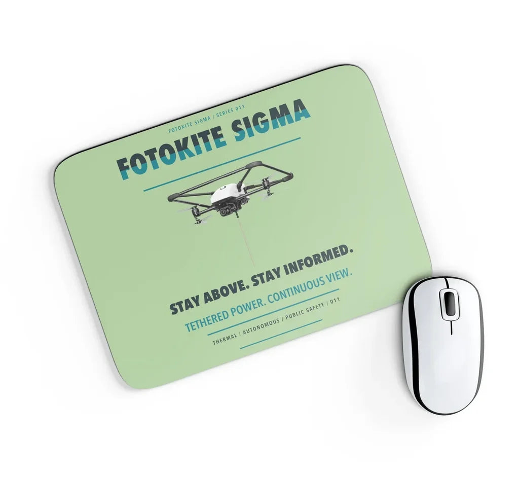 Fotokite Sigma design on light green rectangle mouse pad