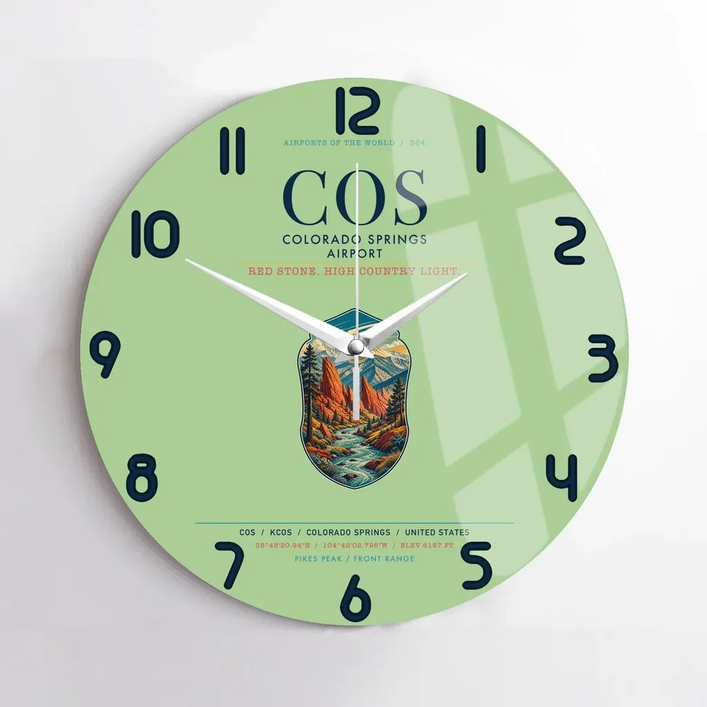 Colorado Springs Airport (COS) design on light green no frame wall clock