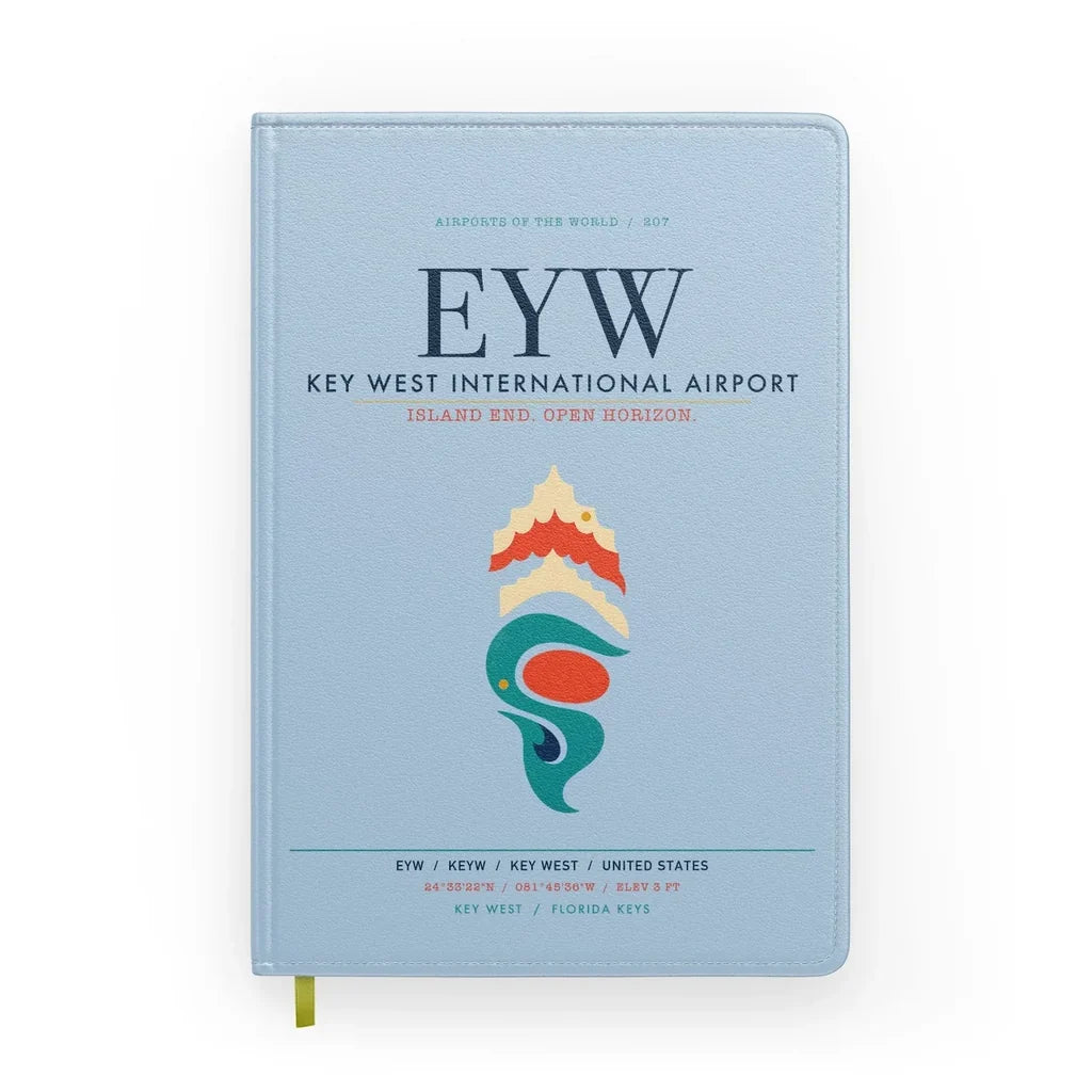 Key West International Airport (EYW) design on light blue notebook