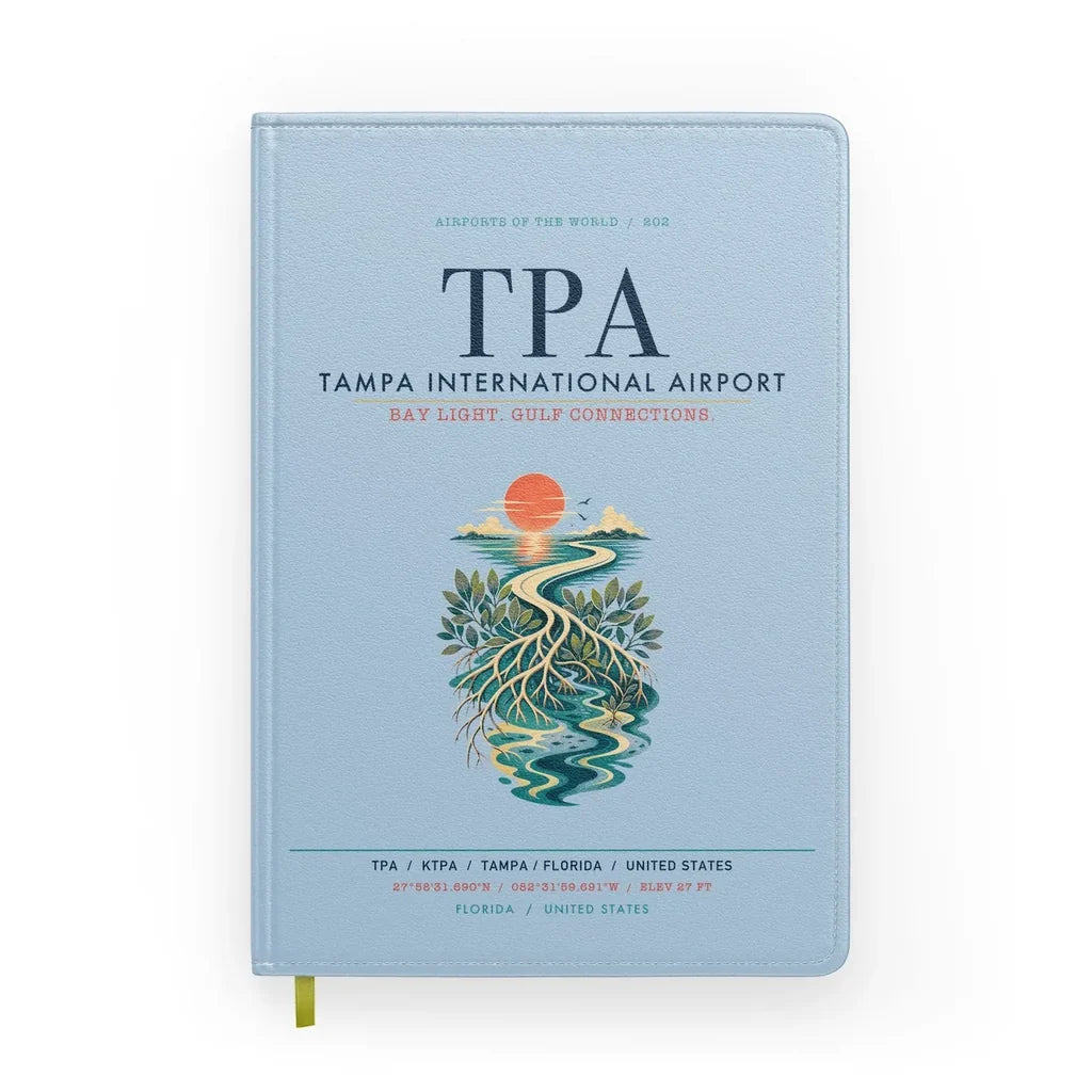 Tampa International Airport (TPA) design on light blue notebook