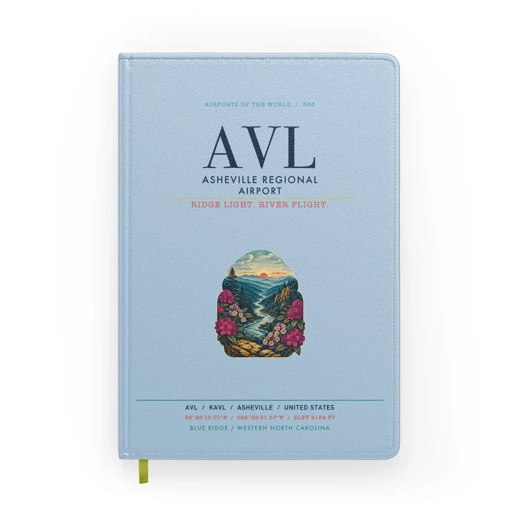 Asheville Regional Airport (AVL) design on light blue notebook
