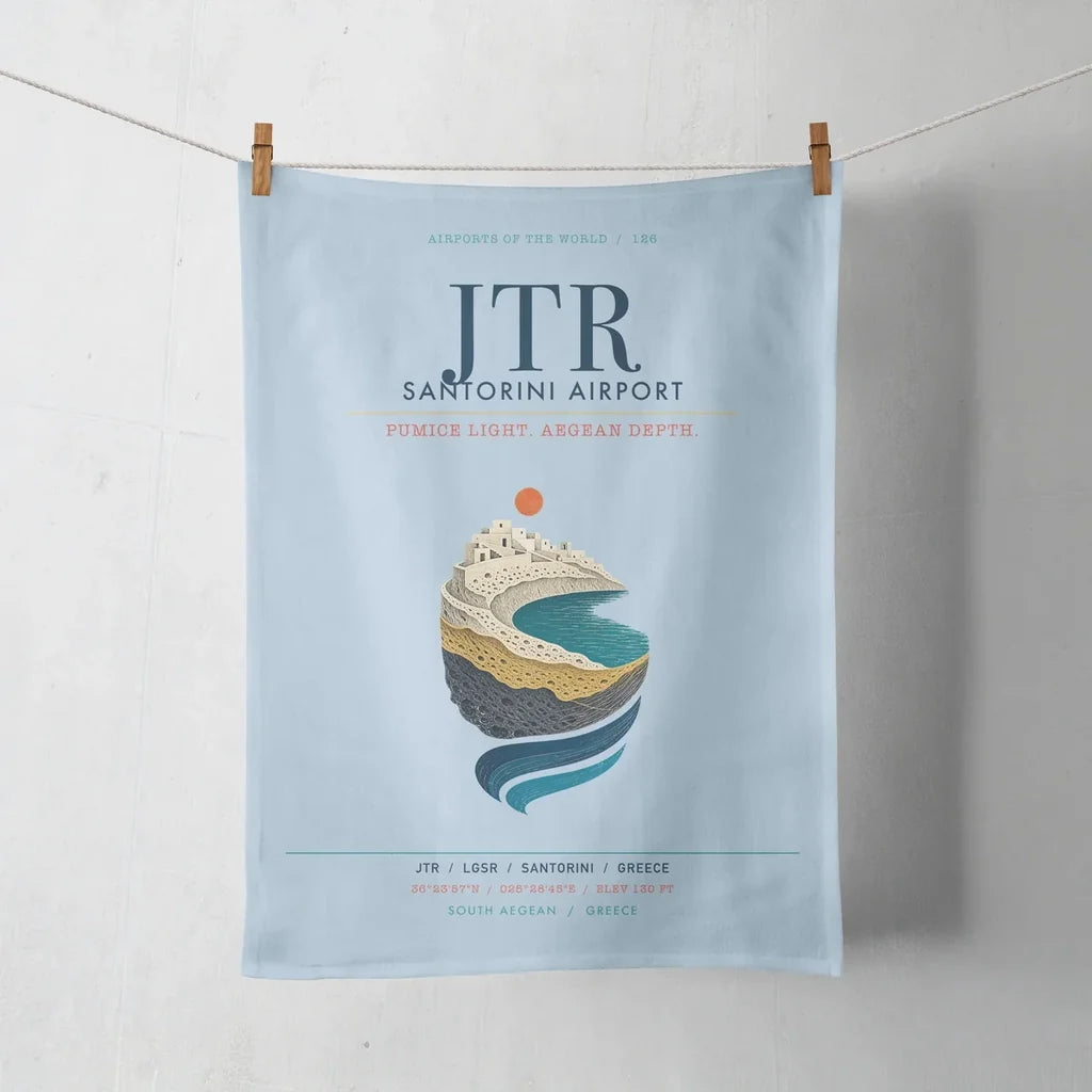 Santorini Airport (JTR) design on light blue towel
