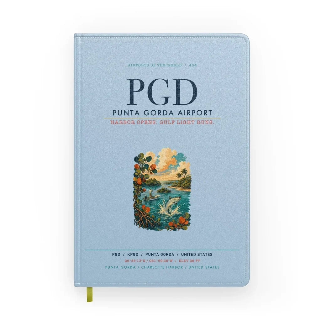 Punta Gorda Airport (PGD) design on light blue notebook