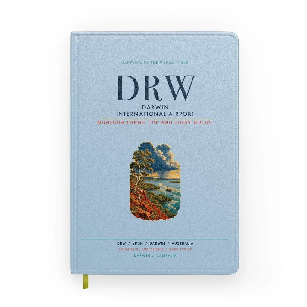 Darwin International Airport (DRW) design on light blue notebook