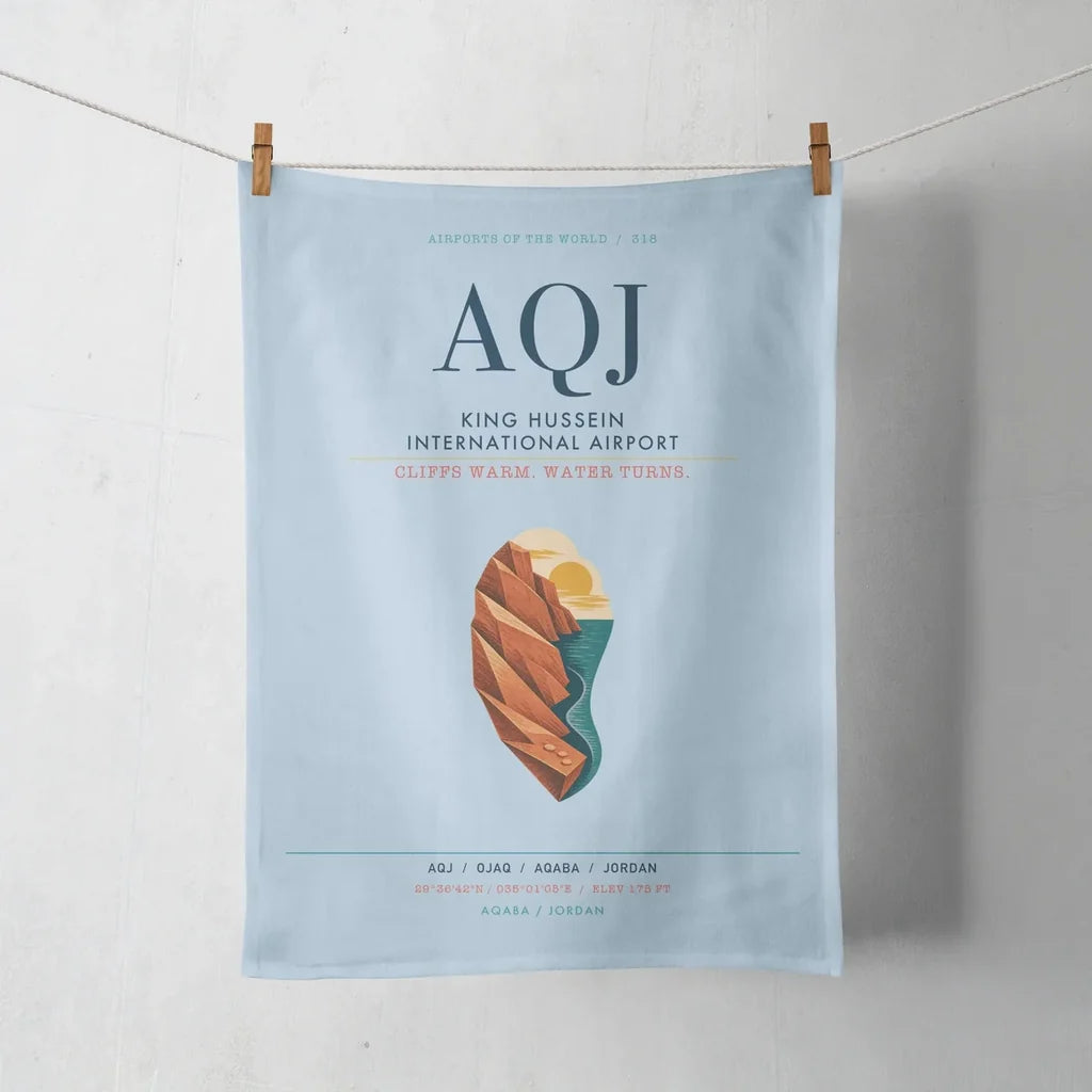 King Hussein International Airport (AQJ) design on light blue towel