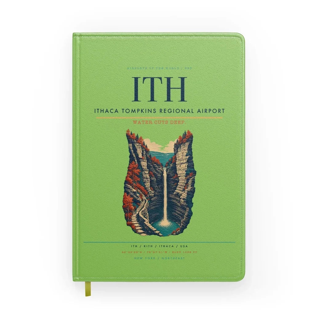 Ithaca Tompkins Regional Airport (ITH) design on light green notebook