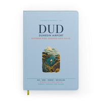 Thumbnail for Dunedin Airport (DUD) design on light blue notebook
