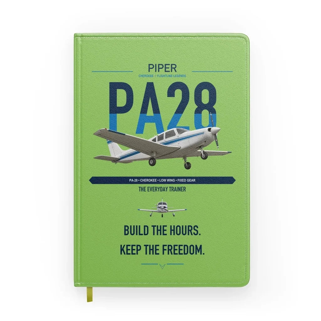 Piper PA-28 Cherokee design on light green notebook