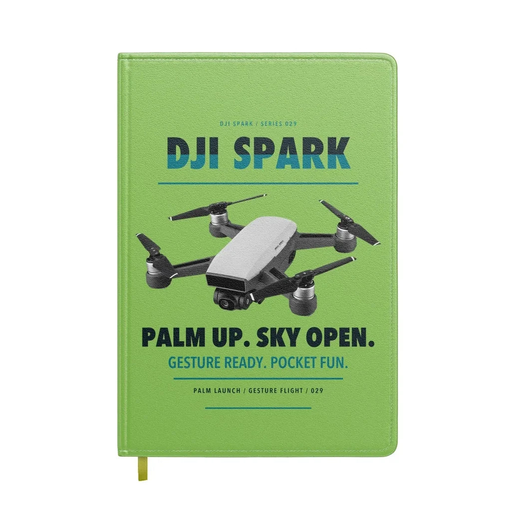 DJI Spark design on light green notebook