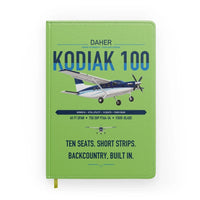 Thumbnail for Daher Kodiak 100 Series III design on light green notebook