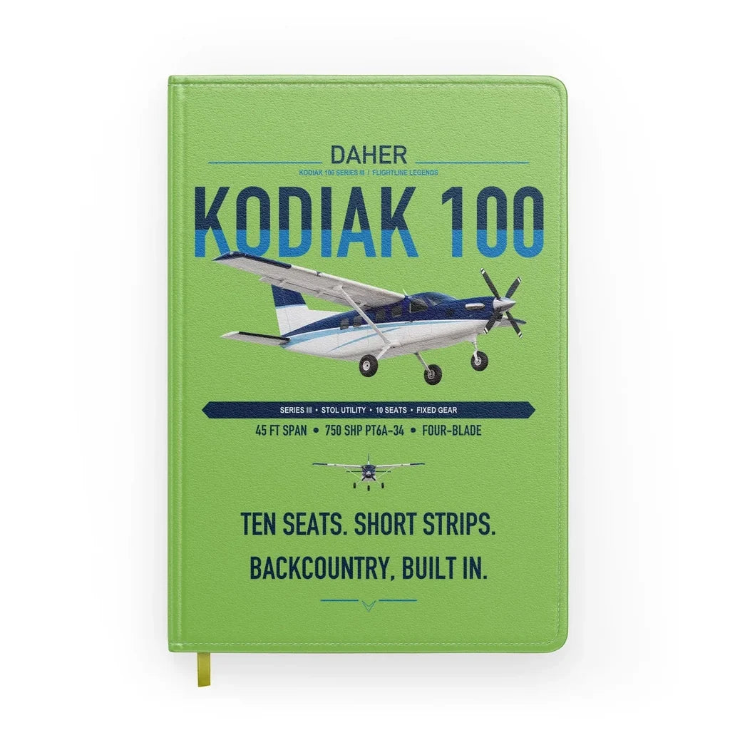 Daher Kodiak 100 Series III design on light green notebook