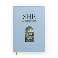 Thumbnail for Shenyang Taoxian International Airport (SHE) design on light blue notebook
