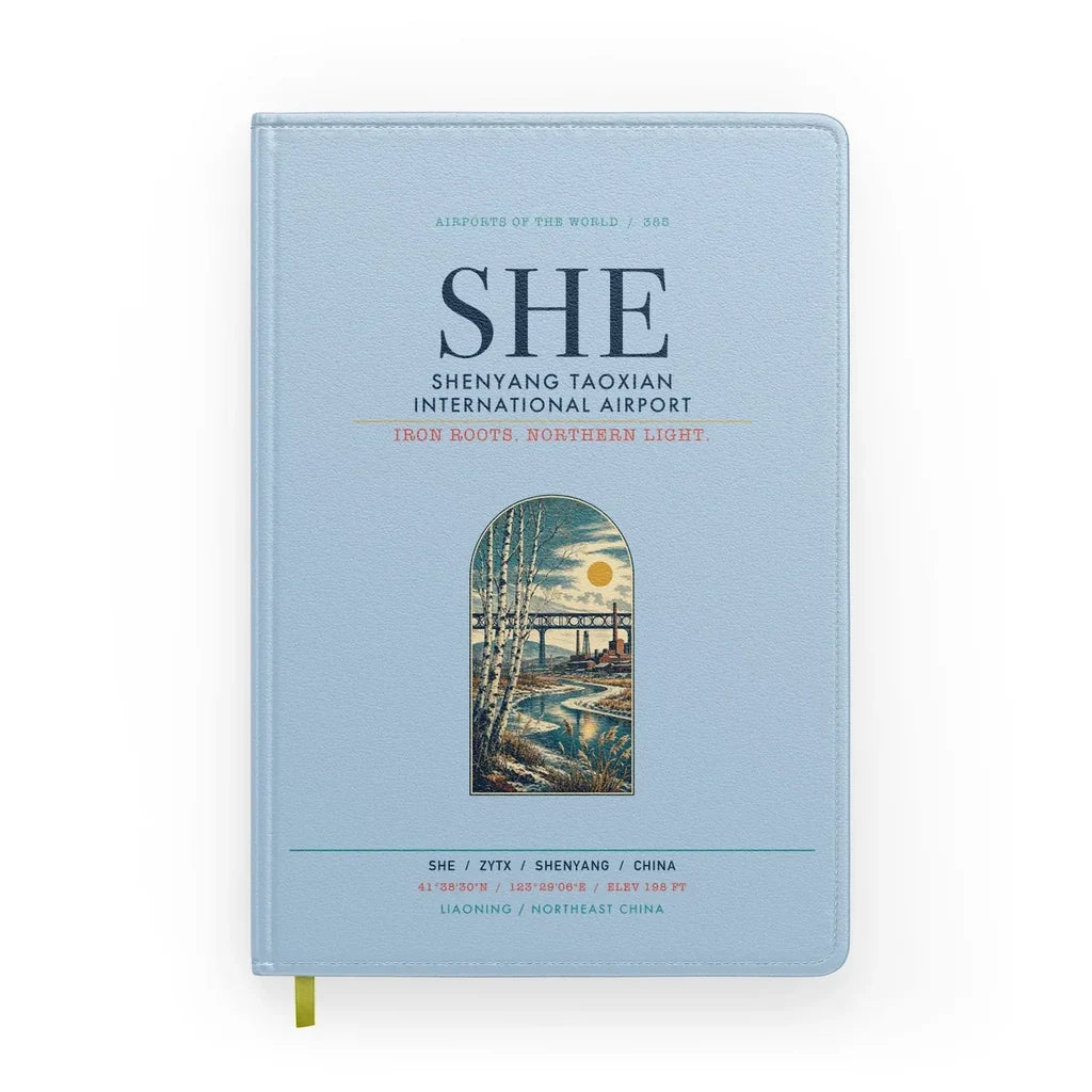 Shenyang Taoxian International Airport (SHE) design on light blue notebook