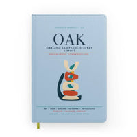 Thumbnail for Oakland San Francisco Bay Airport (OAK) design on light blue notebook